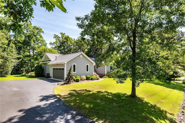 1412 Darrell Dr, Midlothian, VA 23114 - view of side of property featuring driveway, an attached garage, and a yard