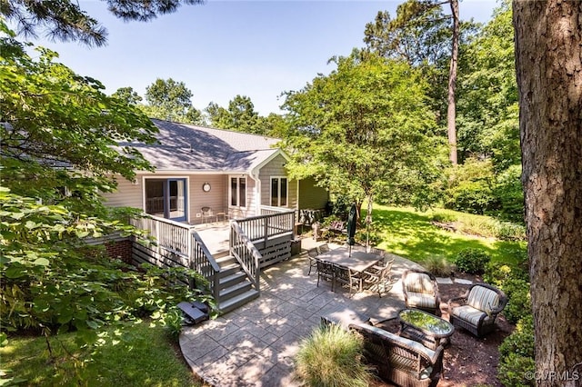 1412 Darrell Dr, Midlothian, VA 23114 - view of front of home featuring a patio, a deck, a shingled roof, a fire pit, and a front lawn