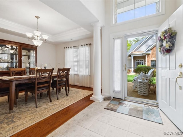 442 Dunlin Ct, Midlothian, VA 23114 - entrance foyer featuring ornate columns, healthy amount of natural light, a chandelier, crown molding, and a tray ceiling