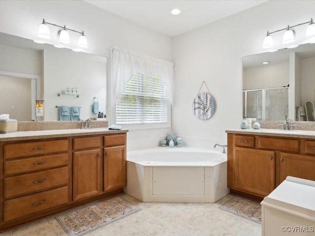 442 Dunlin Ct, Midlothian, VA 23114 - bathroom featuring a stall shower, two vanities, and a garden tub