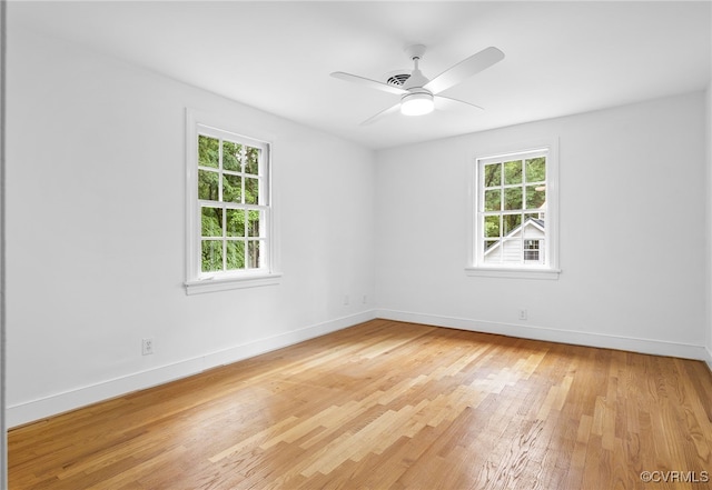 13531 W Salisbury Rd, Midlothian, VA 23113 - empty room with plenty of natural light, light wood-style flooring, and baseboards