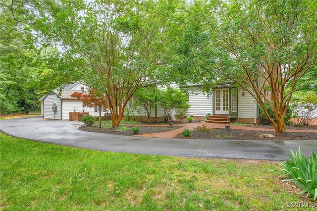 13531 W Salisbury Rd, Midlothian, VA 23113 - view of property hidden behind natural elements with entry steps, french doors, a front yard, and driveway