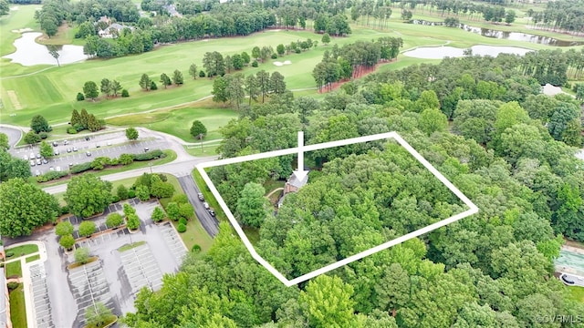 13531 W Salisbury Rd, Midlothian, VA 23113 - aerial view of property and surrounding area with a nearby body of water, a golf course, property parcel outlined, and a tree filled landscape