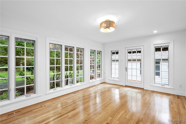 13531 W Salisbury Rd, Midlothian, VA 23113 - unfurnished sunroom featuring plenty of natural light, french doors, wood finished floors, and baseboards