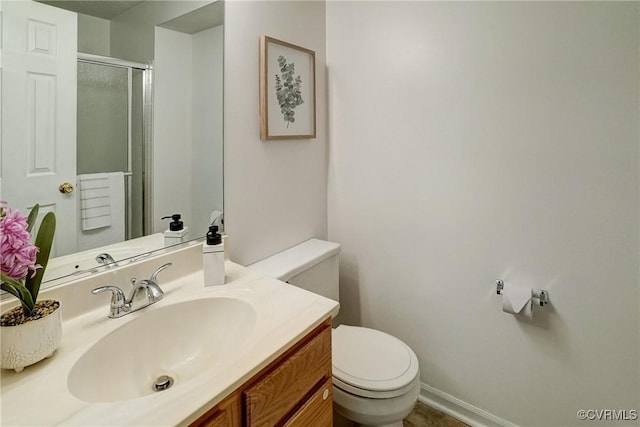 10205 Wolfe Manor Ct Unit 1012, Glen Allen, VA 23060 - bathroom with toilet, a shower stall, vanity, and baseboards
