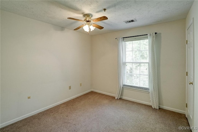 10205 Wolfe Manor Ct Unit 1012, Glen Allen, VA 23060 - spare room with plenty of natural light, a ceiling fan, light colored carpet, baseboards, and a textured ceiling