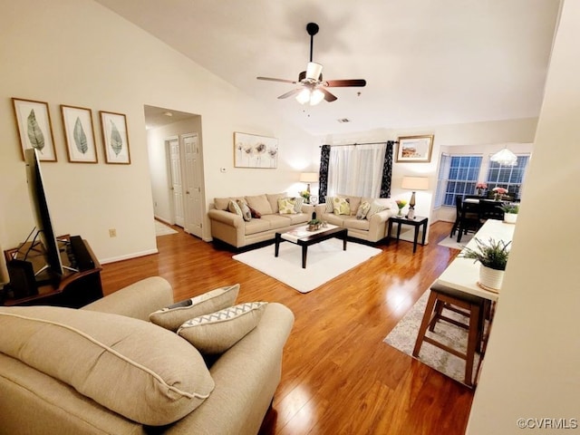 10205 Wolfe Manor Ct Unit 1012, Glen Allen, VA 23060 - living area with vaulted ceiling, a ceiling fan, wood finished floors, and baseboards