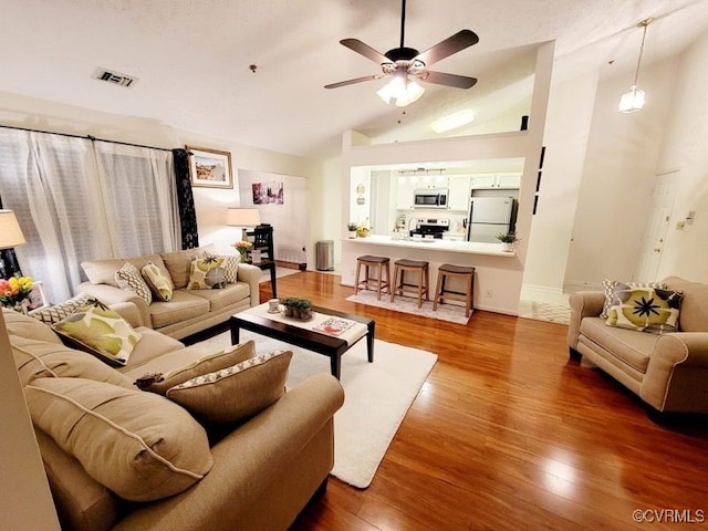 10205 Wolfe Manor Ct Unit 1012, Glen Allen, VA 23060 - living area with lofted ceiling, wood finished floors, and ceiling fan