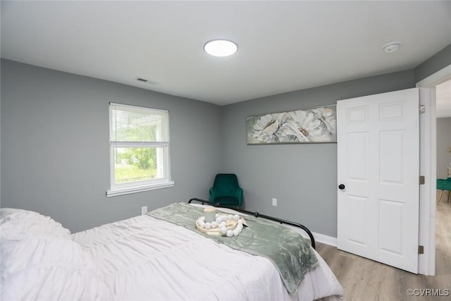 935 Wilcox St, Petersburg, VA 23803 - bedroom with wood finished floors and baseboards