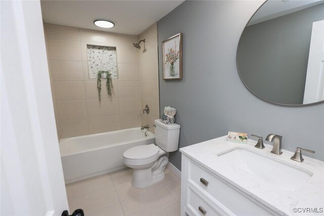 935 Wilcox St, Petersburg, VA 23803 - full bath featuring toilet, vanity, shower / bath combination, tile patterned flooring, and baseboards