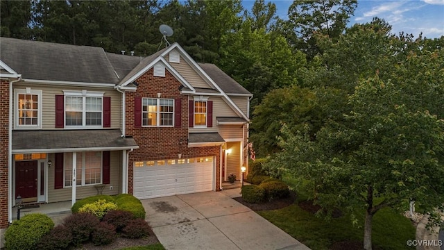 1753 Rose Mill Cir, Midlothian, VA 23112 - view of front of home featuring concrete driveway, an attached garage, and roof with shingles