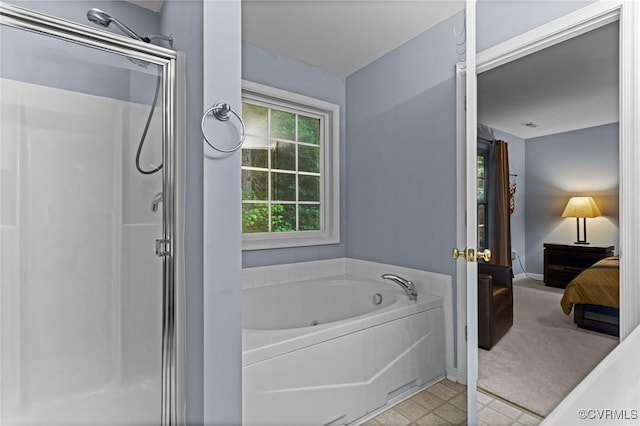 1753 Rose Mill Cir, Midlothian, VA 23112 - bathroom with a stall shower, ensuite bathroom, a tub with jets, and baseboards