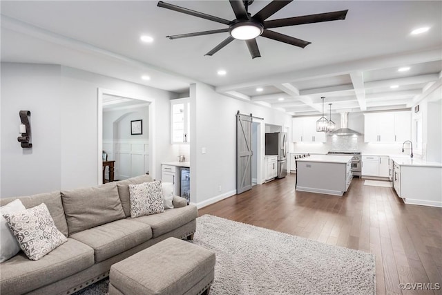 14104 Waters Edge Cir, Midlothian, VA 23112 - living room featuring a barn door, recessed lighting, dark wood-type flooring, a ceiling fan, and beam ceiling