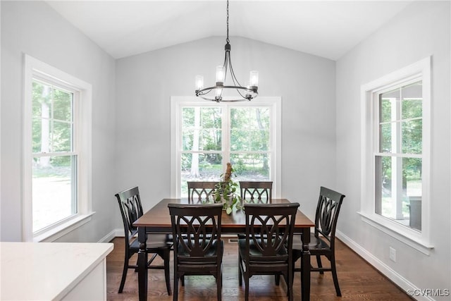 14104 Waters Edge Cir, Midlothian, VA 23112 - dining space with a chandelier, dark wood-style floors, vaulted ceiling, and baseboards