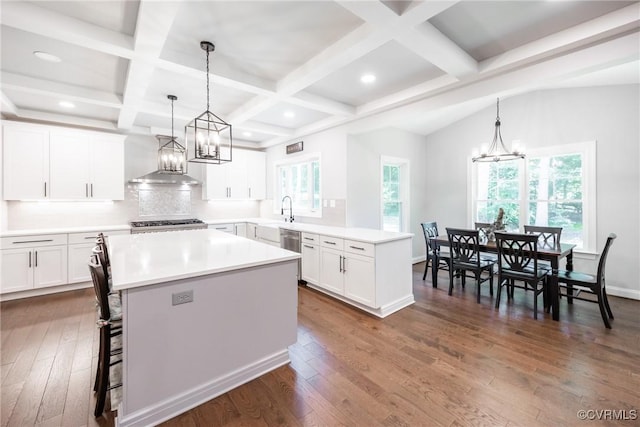 14104 Waters Edge Cir, Midlothian, VA 23112 - kitchen featuring a chandelier, dark wood-type flooring, light countertops, coffered ceiling, and a center island