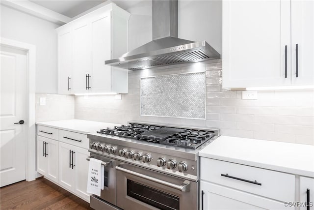 14104 Waters Edge Cir, Midlothian, VA 23112 - kitchen featuring range with two ovens, wall chimney exhaust hood, light countertops, and white cabinetry