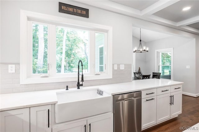 14104 Waters Edge Cir, Midlothian, VA 23112 - kitchen featuring stainless steel dishwasher, a sink, a peninsula, backsplash, and light countertops