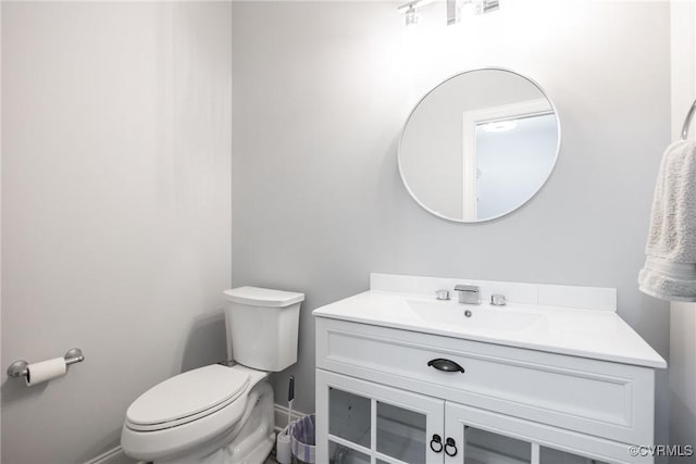 14104 Waters Edge Cir, Midlothian, VA 23112 - half bathroom with vanity, toilet, and baseboards