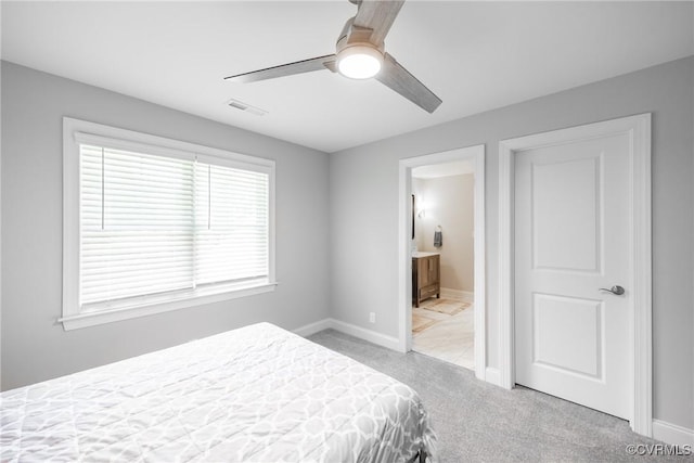 14104 Waters Edge Cir, Midlothian, VA 23112 - carpeted bedroom featuring baseboards, ensuite bathroom, and a ceiling fan