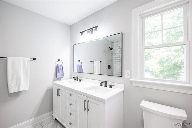 14104 Waters Edge Cir, Midlothian, VA 23112 - full bath with marble look tiles, double vanity, baseboards, toilet, and a shower