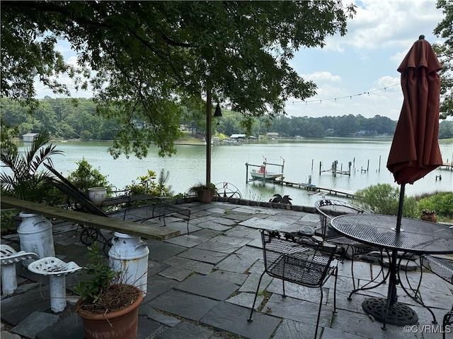 1686 Locust Grove Rd, Topping, VA 23169 - view of patio featuring a water view and a boat dock