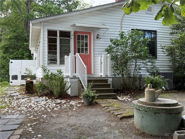 1686 Locust Grove Rd, Topping, VA 23169 - view of front of home featuring cooling unit