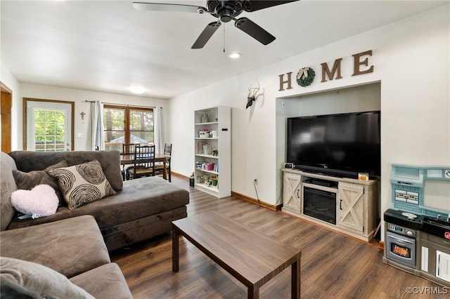 19504 Walker Ave, Chesterfield, VA 23834 - living room with wood finished floors, ceiling fan, baseboards, a glass covered fireplace, and recessed lighting