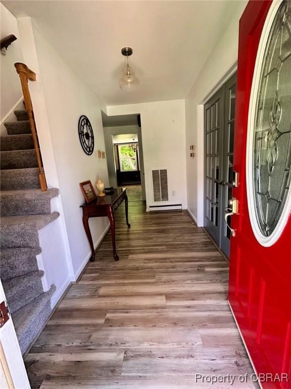 402 N Ivy Ave, Highland Springs, VA 23075 - entryway featuring stairway, wood finished floors, baseboards, and french doors