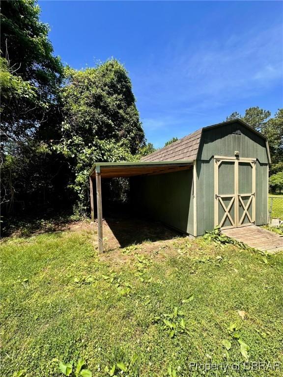 402 N Ivy Ave, Highland Springs, VA 23075 - view of shed featuring a carport