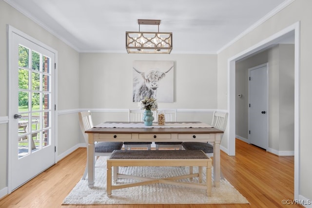 3511 Respess Rd, Midlothian, VA 23112 - dining space with light wood-style floors, crown molding, and baseboards