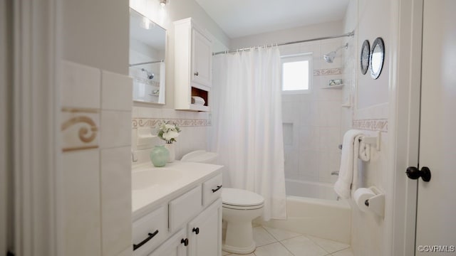 3511 Respess Rd, Midlothian, VA 23112 - bathroom with vanity, shower / bath combo, toilet, tile patterned floors, and tile walls