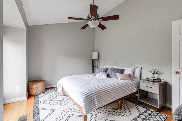 12125 Shore View Dr, Henrico, VA 23233 - bedroom featuring vaulted ceiling, light wood-type flooring, baseboards, and ceiling fan