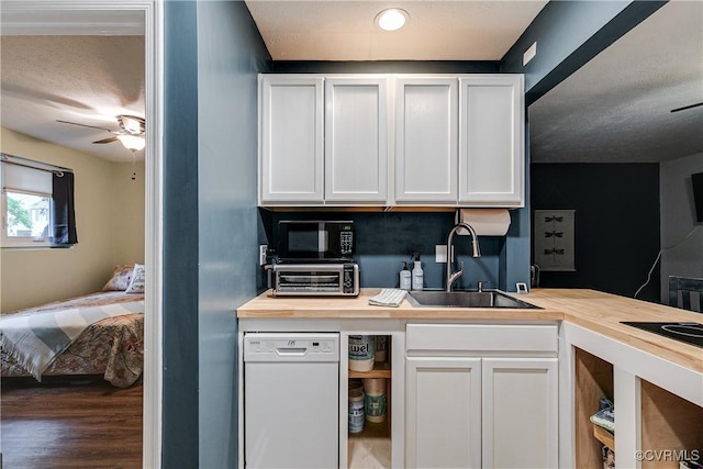 12125 Shore View Dr, Henrico, VA 23233 - kitchen featuring a sink, dishwasher, wood counters, white cabinets, and a ceiling fan