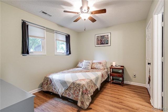 12125 Shore View Dr, Henrico, VA 23233 - bedroom featuring baseboards, light wood finished floors, and a ceiling fan