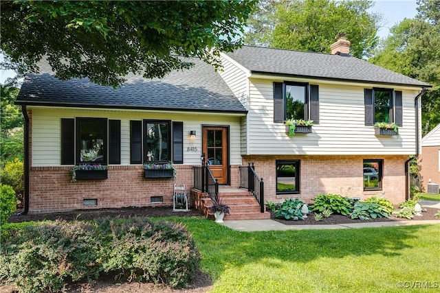 8415 Freestone Ave, Henrico, VA 23229 - tri-level home with brick siding, a chimney, a front yard, a shingled roof, and cooling unit