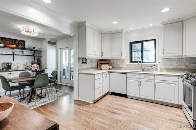 8415 Freestone Ave, Henrico, VA 23229 - kitchen featuring dishwasher, a sink, stainless steel gas stove, plenty of natural light, and ornamental molding