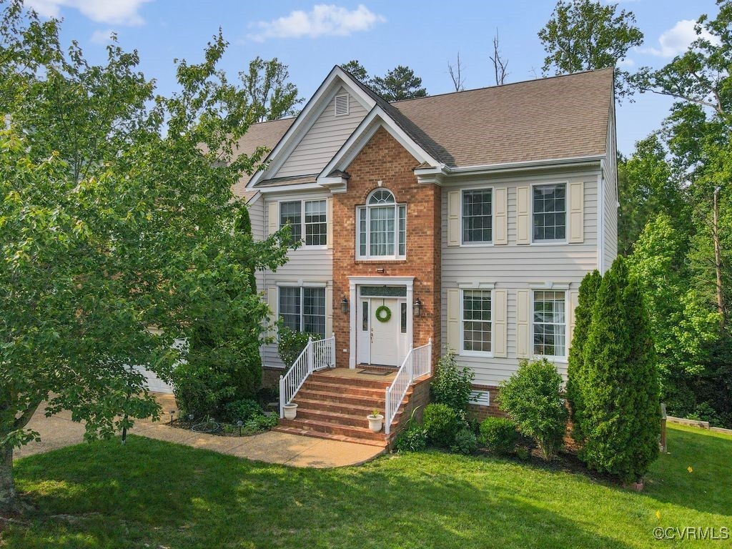 713 Coalbrook Dr, Midlothian, VA 23114 - view of front of property featuring a front yard and brick siding