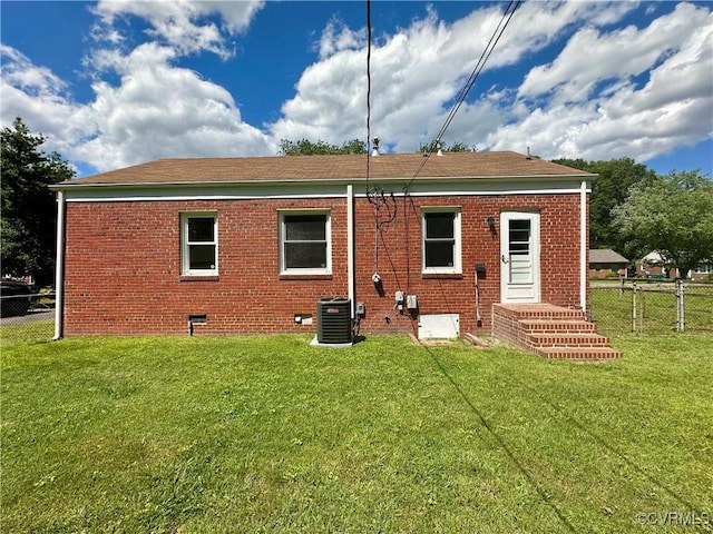 1709 Glenview Rd, Richmond, VA 23222 - back of property featuring crawl space, central AC unit, and brick siding