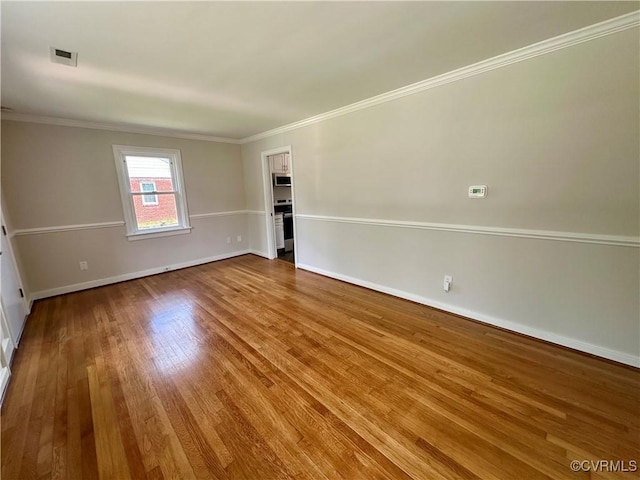 1709 Glenview Rd, Richmond, VA 23222 - unfurnished room featuring wood finished floors, baseboards, and ornamental molding