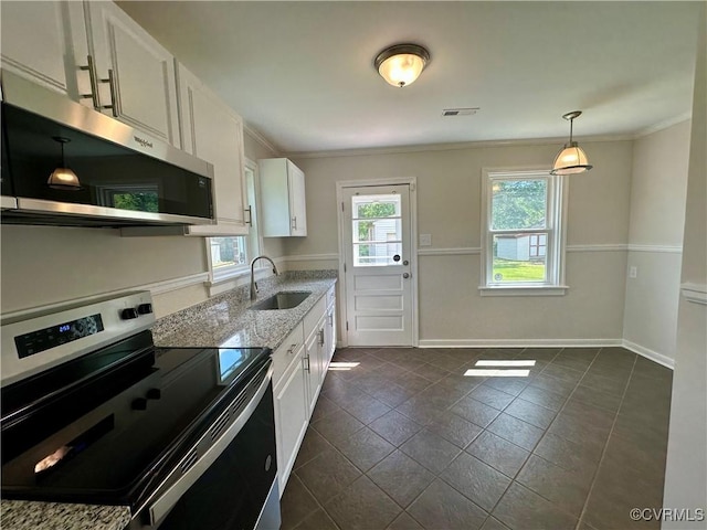 1709 Glenview Rd, Richmond, VA 23222 - kitchen with appliances with stainless steel finishes, a sink, white cabinets, ornamental molding, and light stone countertops