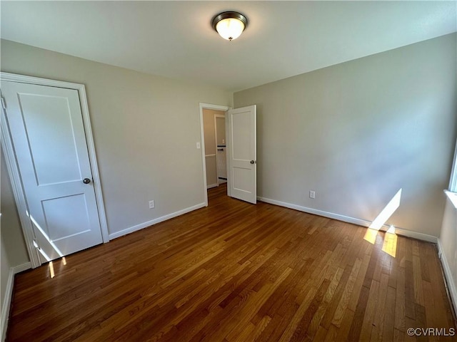 1709 Glenview Rd, Richmond, VA 23222 - unfurnished bedroom with baseboards and wood finished floors