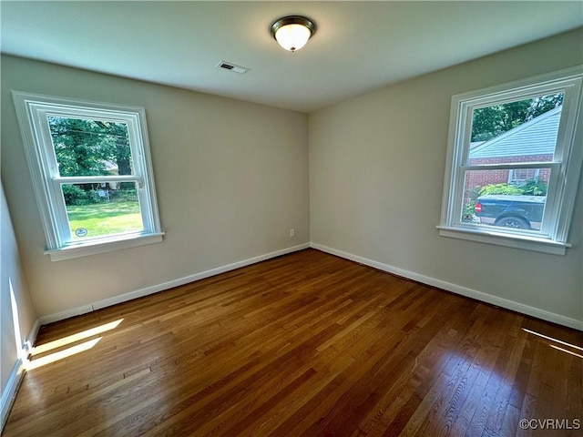1709 Glenview Rd, Richmond, VA 23222 - empty room featuring hardwood / wood-style flooring, baseboards, and plenty of natural light