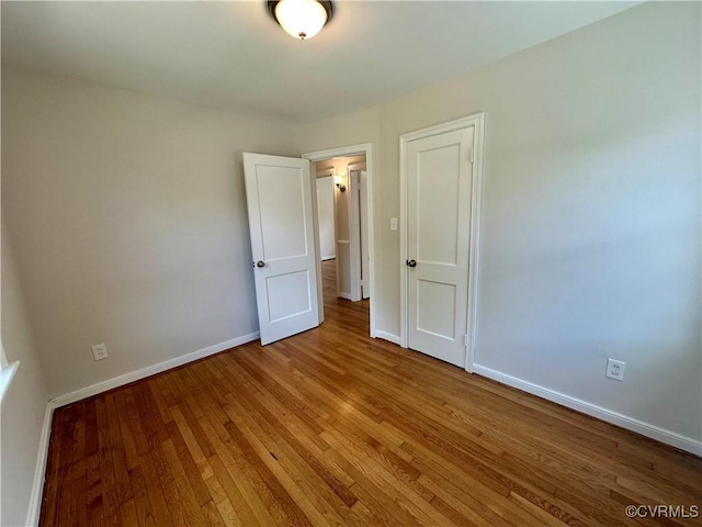 1709 Glenview Rd, Richmond, VA 23222 - unfurnished bedroom with wood finished floors and baseboards