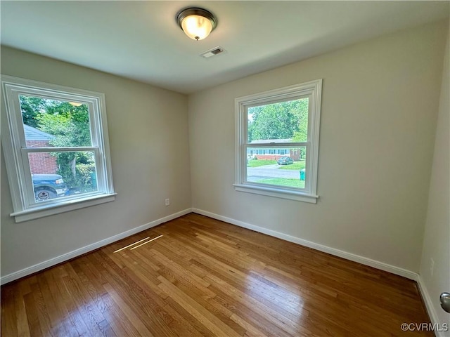 1709 Glenview Rd, Richmond, VA 23222 - empty room with wood finished floors and baseboards