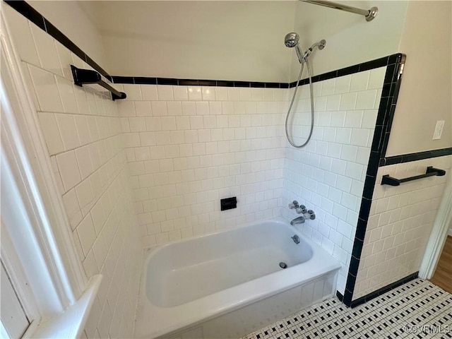 1709 Glenview Rd, Richmond, VA 23222 - full bathroom featuring shower / bath combination, tile patterned flooring, and tile walls