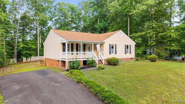12203 King Cotton Ct, Midlothian, VA 23112 - ranch-style house featuring covered porch, crawl space, a front yard, and view of scattered trees
