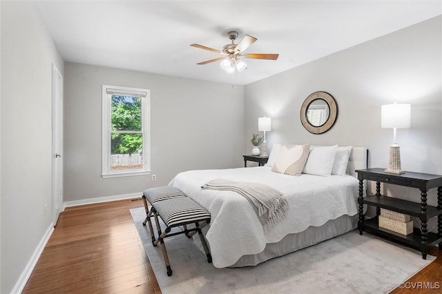 12203 King Cotton Ct, Midlothian, VA 23112 - bedroom featuring light wood-type flooring, baseboards, and a ceiling fan