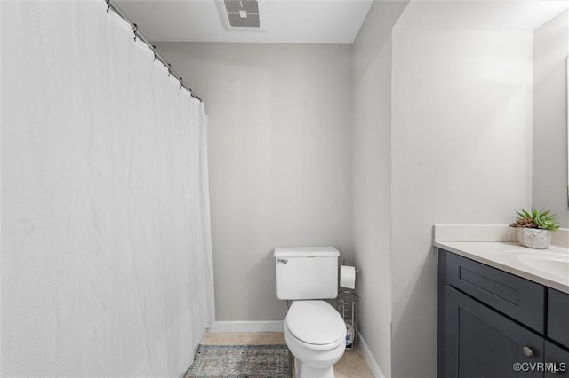 12203 King Cotton Ct, Midlothian, VA 23112 - full bath with vanity, toilet, baseboards, and tile patterned flooring