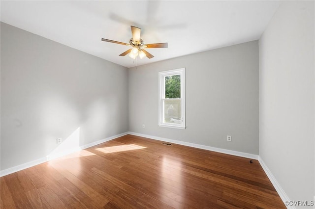 12203 King Cotton Ct, Midlothian, VA 23112 - unfurnished room featuring a ceiling fan, baseboards, and wood finished floors
