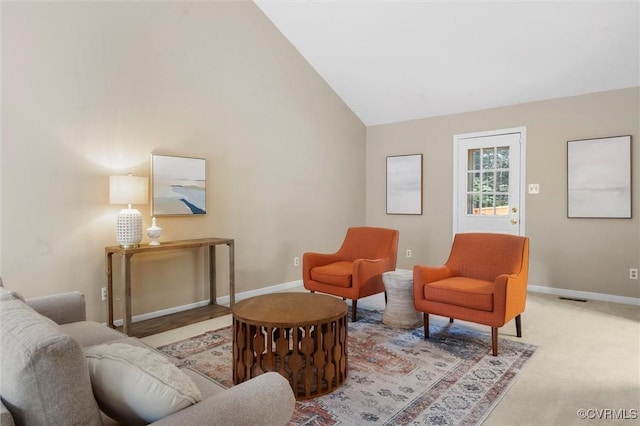 12203 King Cotton Ct, Midlothian, VA 23112 - living area with lofted ceiling, baseboards, and carpet flooring